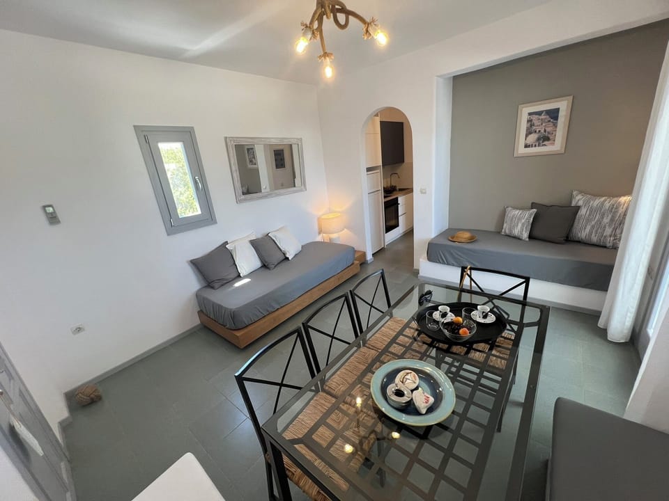 Family Apartment, 1 Bedroom, Sea View | Living area | Flat-screen TV