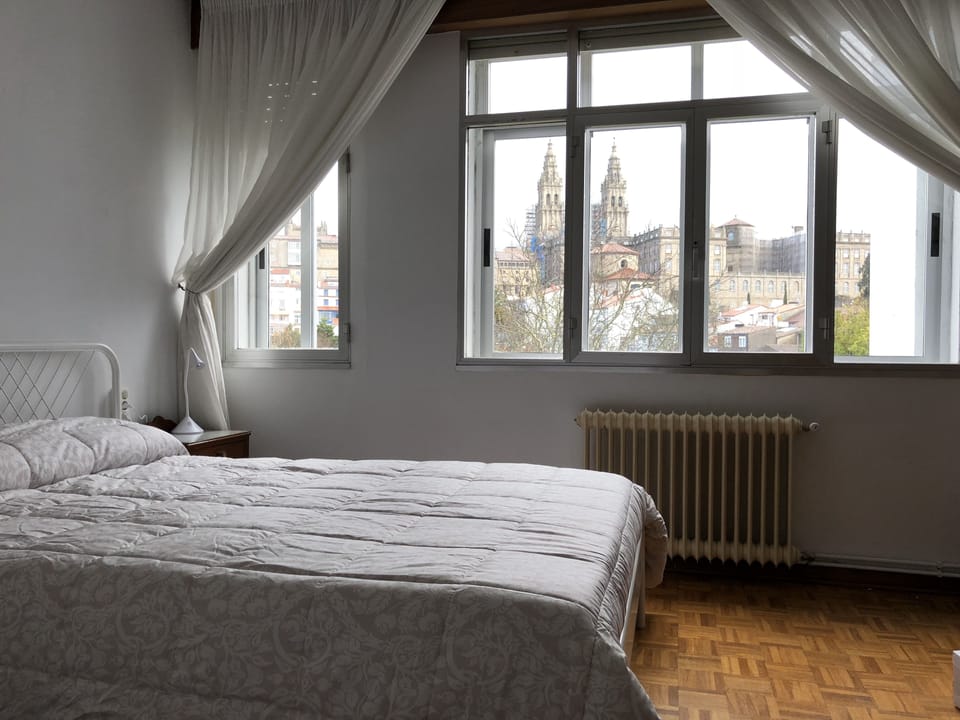 City Triple Room, 1 Bedroom | Desk, blackout drapes, iron/ironing board, free WiFi
