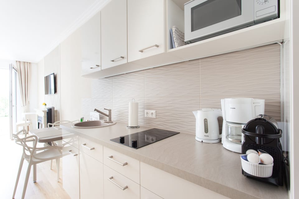 Apartment, Terrace, Garden View (Cleaning Fee Included in Price) | Private kitchen | Full-size fridge, microwave, stovetop, dishwasher