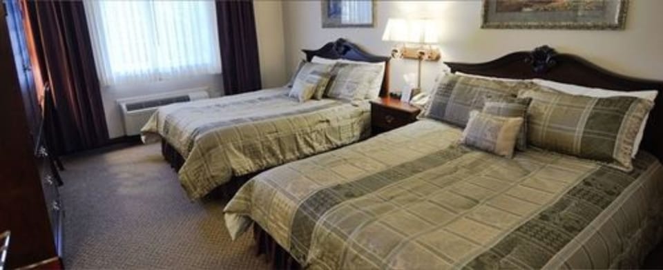 Room | Premium bedding, desk, blackout drapes, iron/ironing board