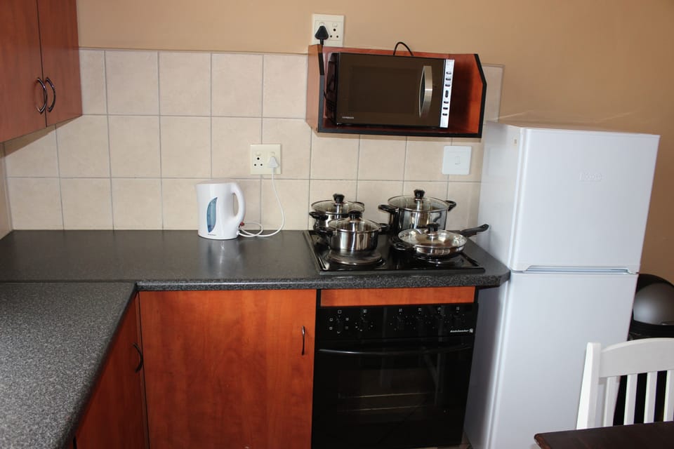 Self Catering Flat | Private kitchen | Fridge, coffee/tea maker, electric kettle