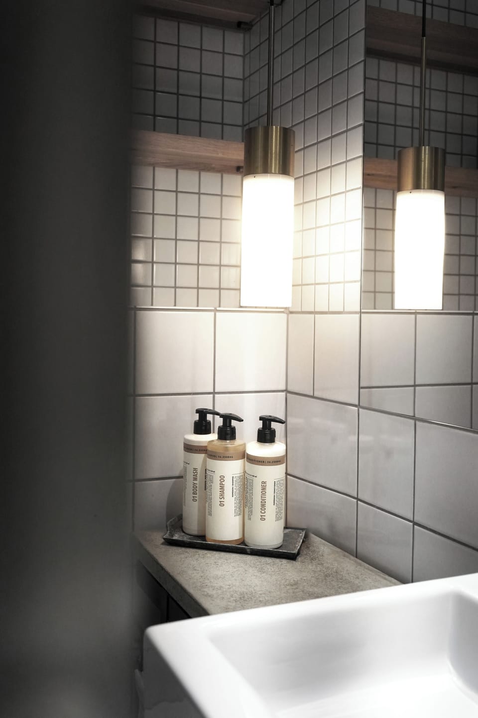 Designer toiletries, hair dryer, towels, soap