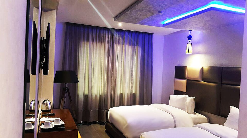 Superior Twin Room | Minibar, in-room safe, desk, free cribs/infant beds
