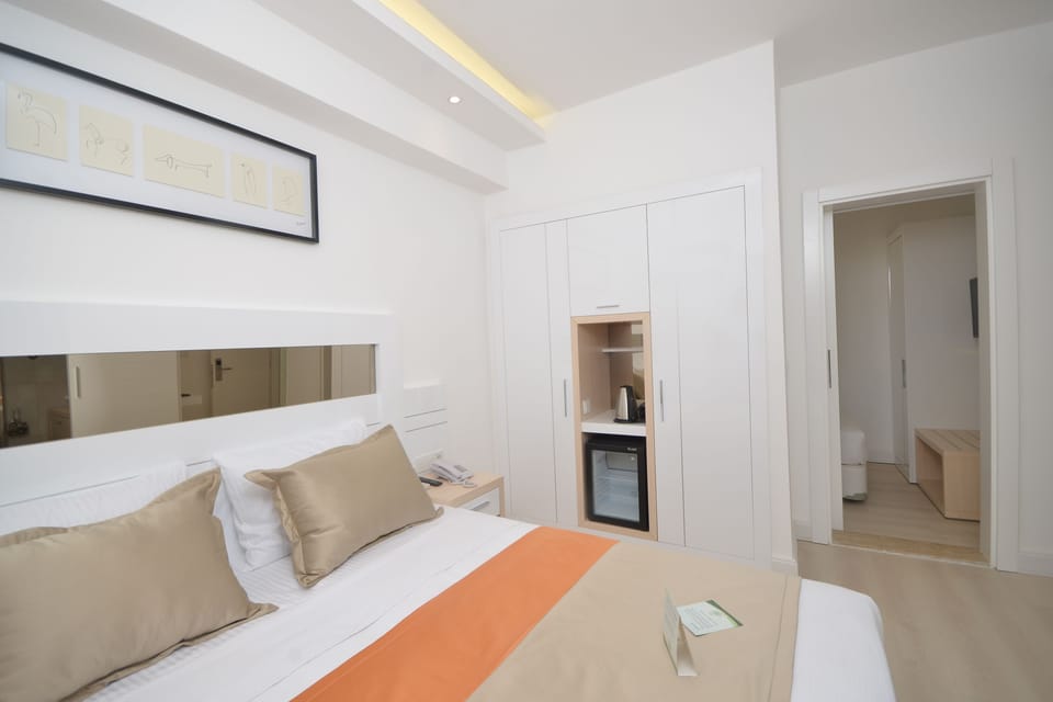Suite, 2 Bedrooms | Minibar, in-room safe, soundproofing, travel crib
