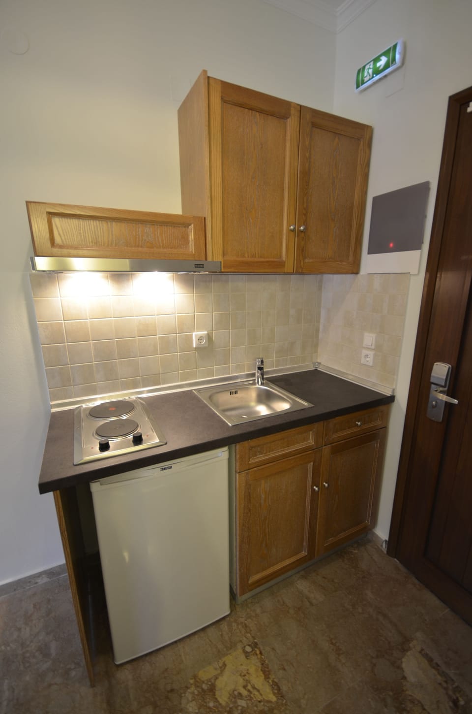Fridge, stovetop, coffee/tea maker, cookware/dishes/utensils