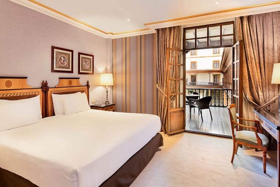 Premium Room, Terrace (Patio de La Reina View) | Down comforters, minibar, in-room safe, desk