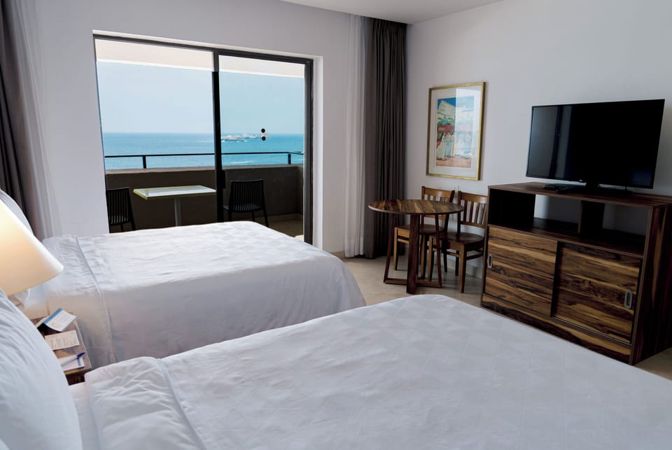 In-room safe, desk, blackout drapes, iron/ironing board