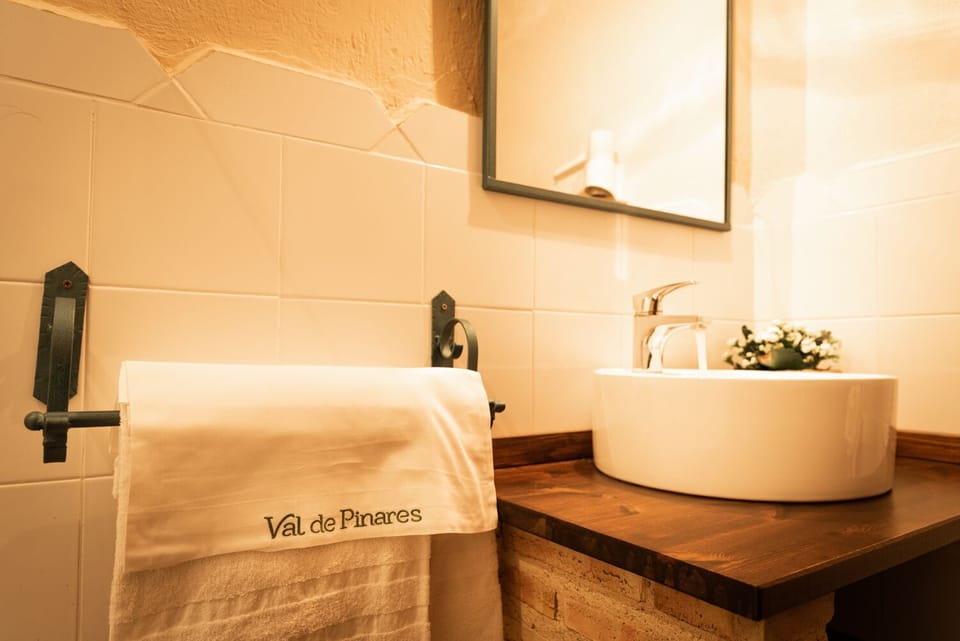 Family Room | Bathroom | Designer toiletries, hair dryer, towels