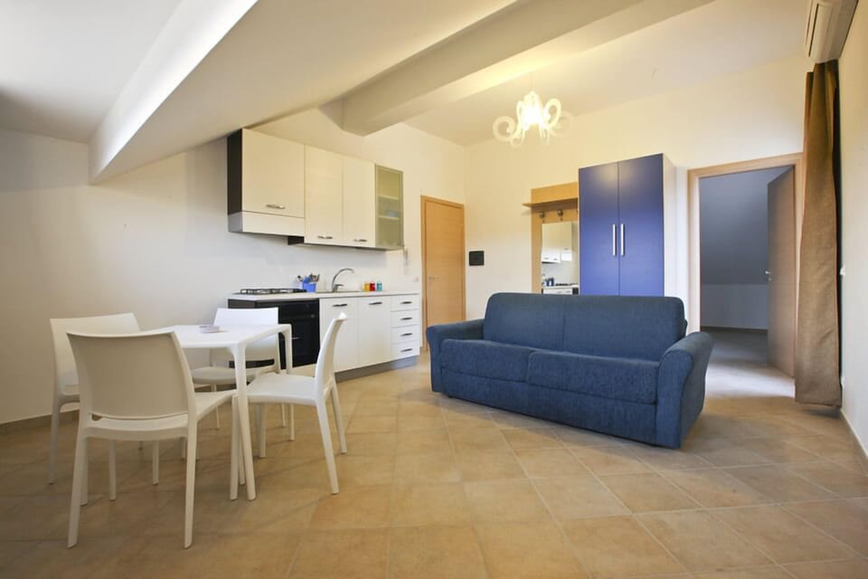 Apartment, 1 Bedroom | Living area | Flat-screen TV
