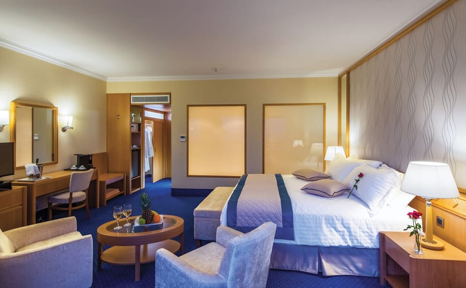 Junior Suite, Land View | Premium bedding, minibar, in-room safe, desk