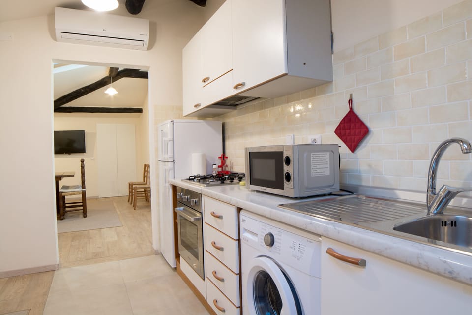 Comfort Apartment, Kitchen, City View (mansard, second floor, no elevator) | Private kitchen | Coffee/tea maker, electric kettle