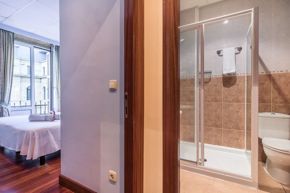 Double Room, Private Bathroom | Premium bedding, minibar, in-room safe, blackout drapes