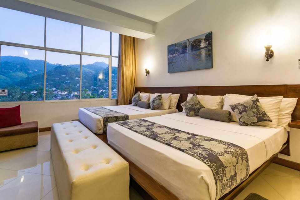Deluxe Family Room | Minibar, individually furnished, free WiFi, bed sheets
