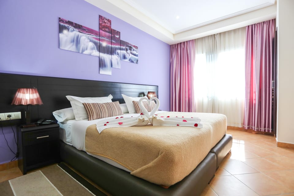 Standard Suite | Premium bedding, blackout drapes, soundproofing, free WiFi