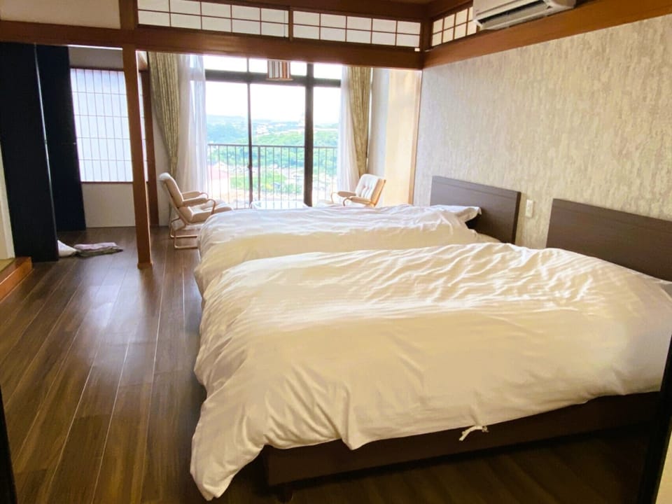 Family Suite, Balcony | In-room safe, bed sheets