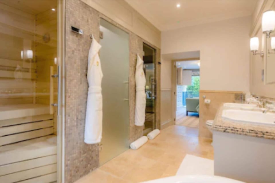The Gate Lodge | Bathroom | Designer toiletries, hair dryer, bathrobes, slippers