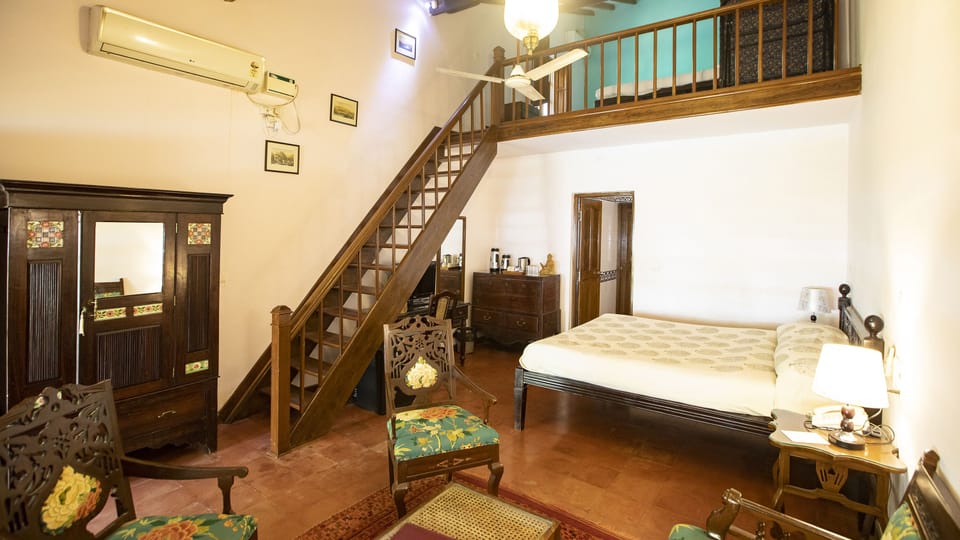 Deluxe Duplex, 1 Bedroom, Non Smoking, Pool View | In-room safe, individually decorated, individually furnished, desk