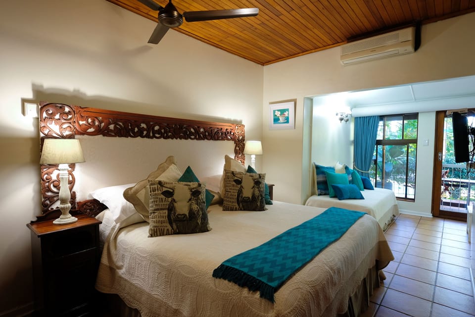 Deluxe Triple Room, Multiple Beds (Room C) | In-room safe, individually decorated, individually furnished, bed sheets