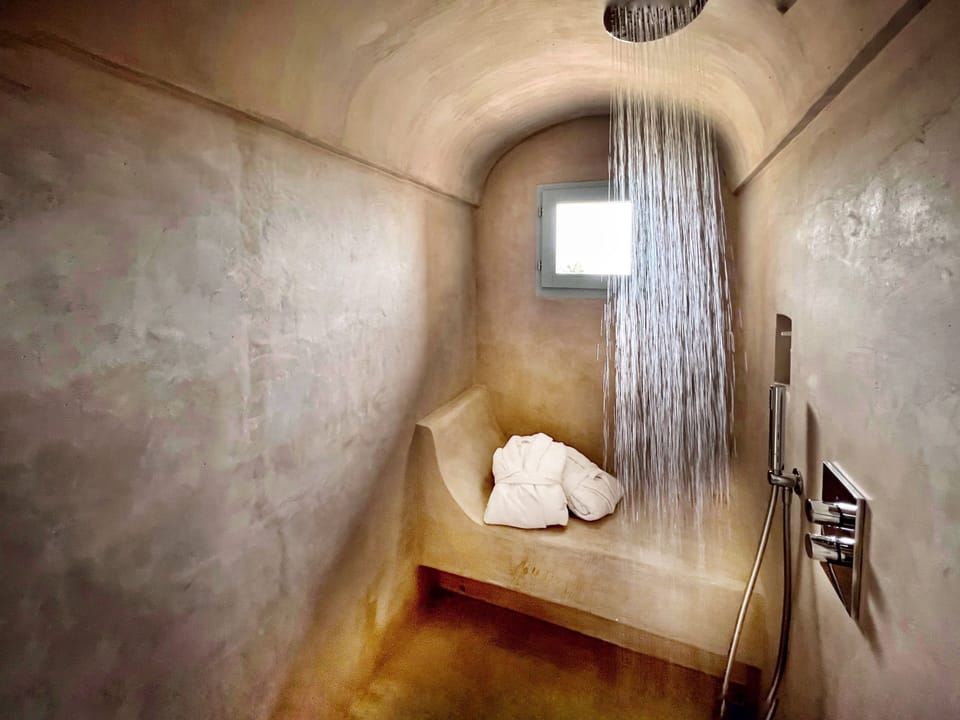 Grand Suite | Bathroom | Shower, rainfall showerhead, designer toiletries, hair dryer