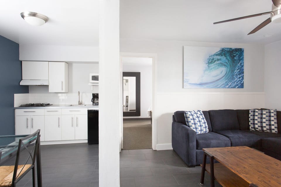 Large 1 Bedroom Queen Suite with Kitchen | Living area | TV