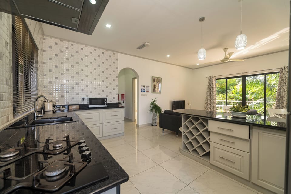 Superior Apartment, 1 Bedroom | Private kitchen | Coffee/tea maker, full-size fridge, microwave, oven