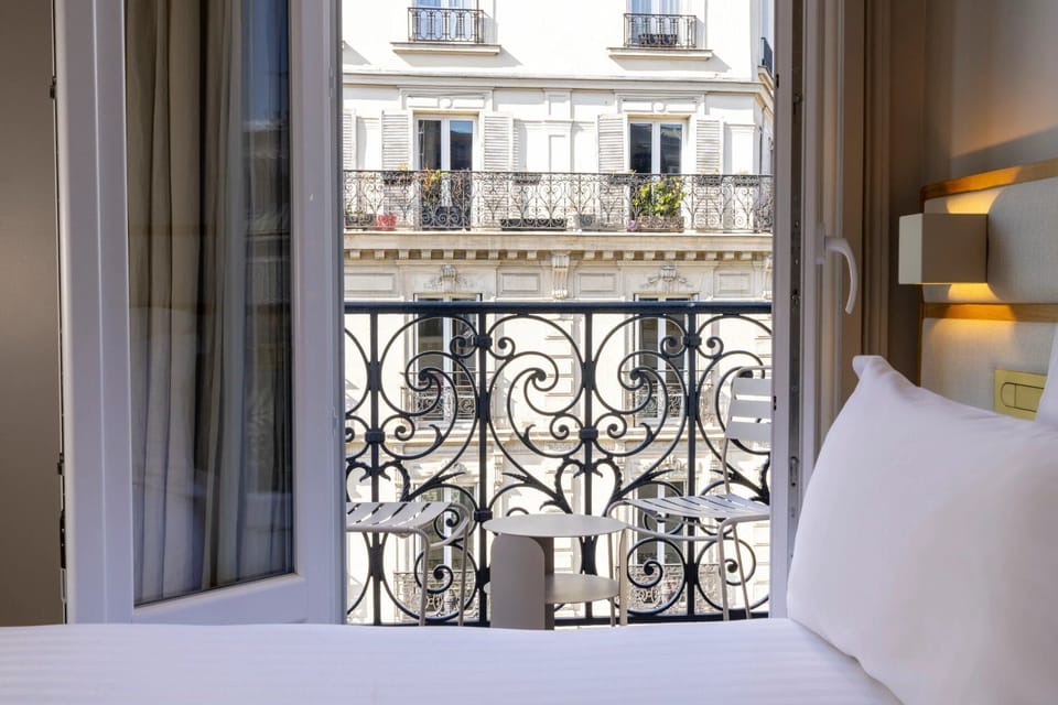 Deluxe room with balcony | Premium bedding, in-room safe, desk, laptop workspace