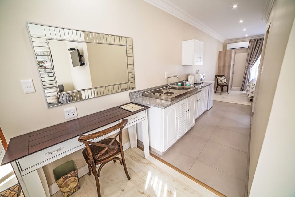 Princess Court Self Catering | Private kitchenette | Coffee/tea maker, electric kettle