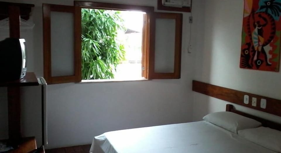 Standard Room | Minibar, individually decorated, blackout drapes, free WiFi