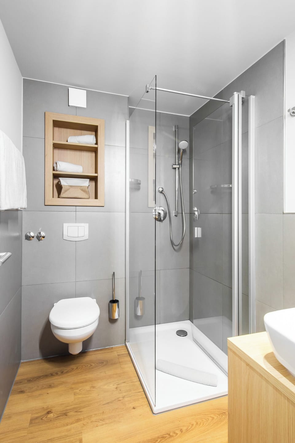 Shower, hair dryer, heated floors, towels