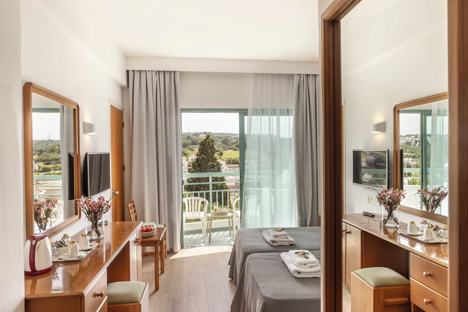 Double or Twin Room, Partial Sea View | Free WiFi, bed sheets