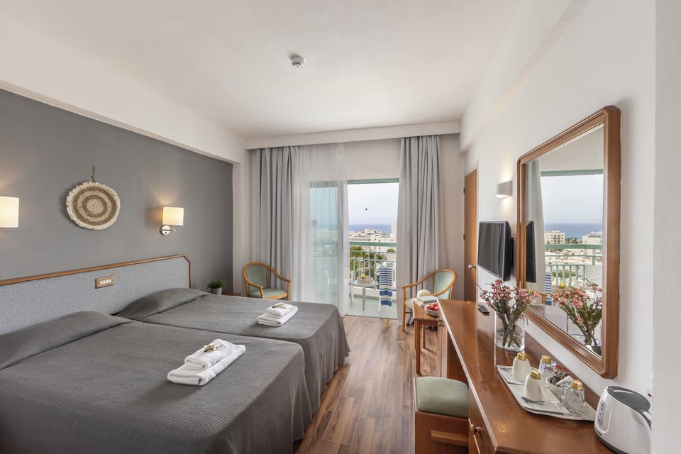 Double or Twin Room, Pool View | Free WiFi, bed sheets