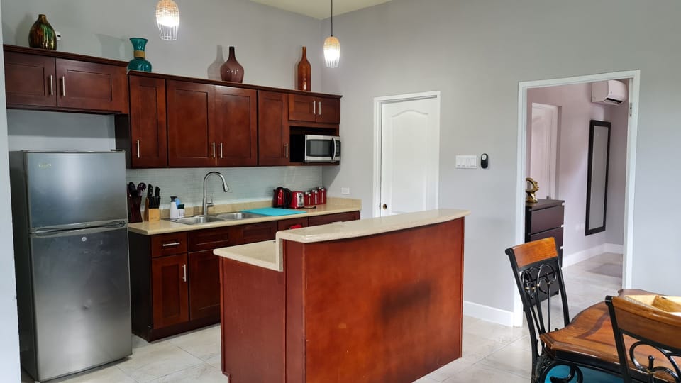 Apartment, Ground Floor | Private kitchen | Full-size fridge, microwave, oven, stovetop