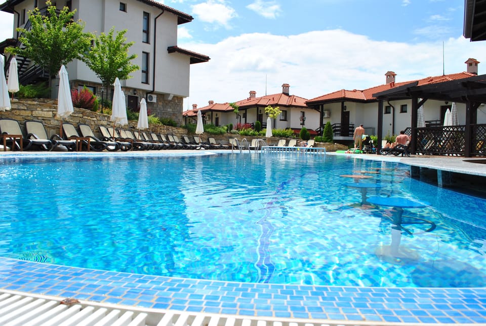 Indoor pool, 4 outdoor pools, open 8:00 AM to 6:00 PM, pool umbrellas