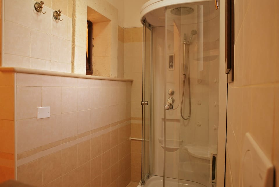 Quadruple Room, Refrigerator, Garden View | Bathroom | Shower, free toiletries, hair dryer, bidet