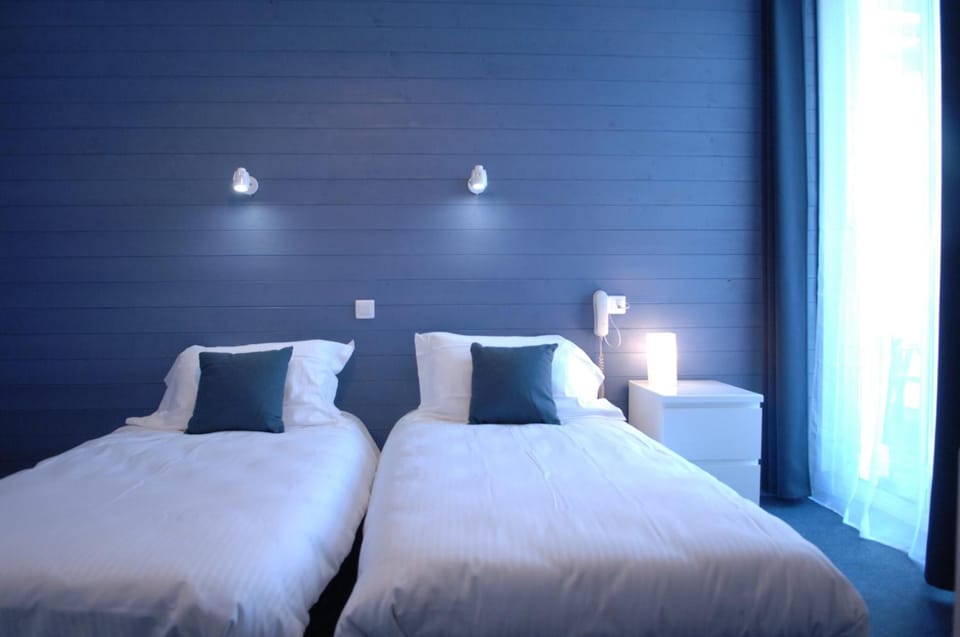 Premium bedding, desk, soundproofing, iron/ironing board