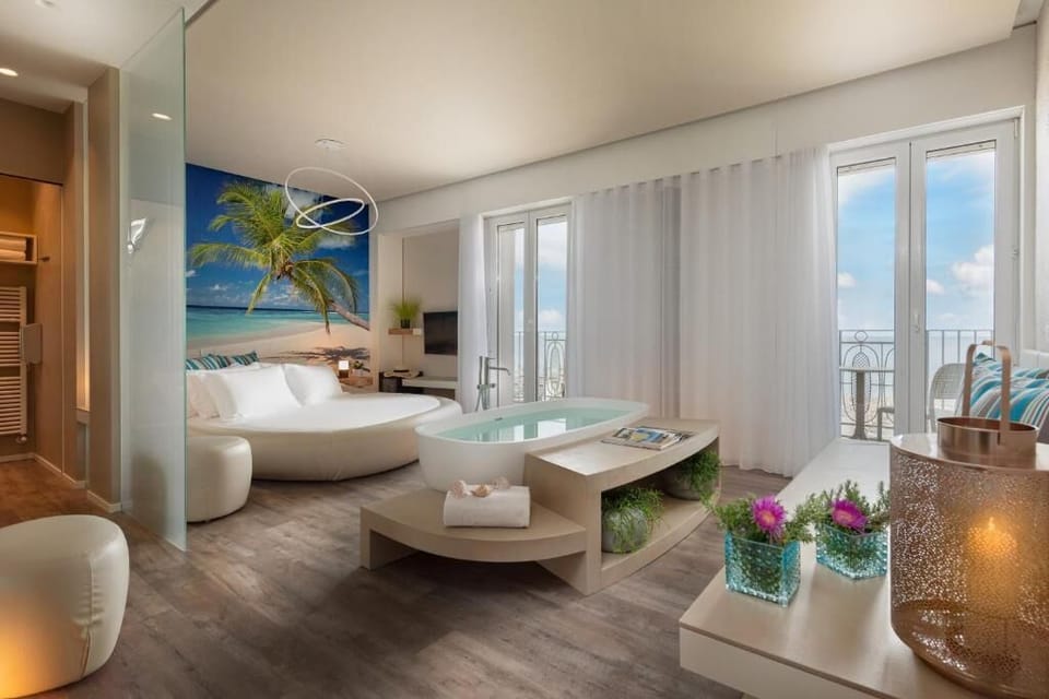 Deluxe Studio Suite, Sea View, Beachfront (beach access included) | In-room safe, WiFi (free), bed sheets