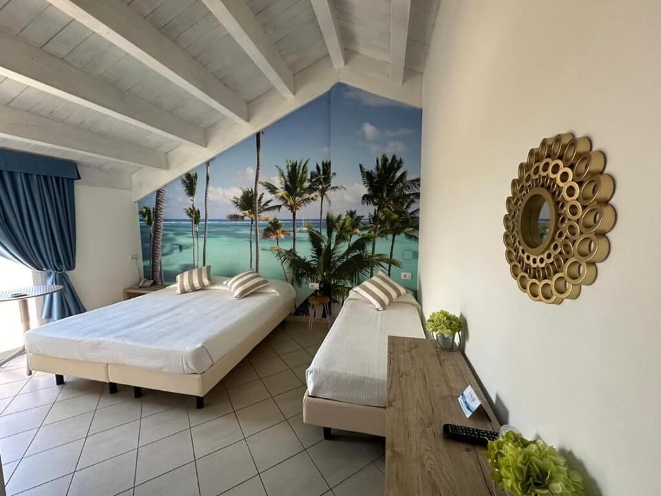 Comfort Triple Room, Balcony, Partial Sea View (beach access included) | In-room safe, WiFi (free), bed sheets