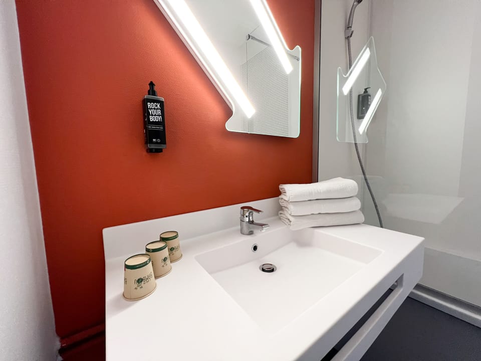 Shower, rainfall showerhead, eco-friendly toiletries, hair dryer