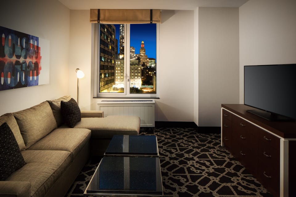 Premium bedding, down comforters, in-room safe, desk