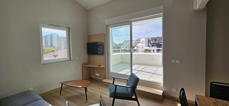 Apartment, Multiple Beds | Living room | Flat-screen TV