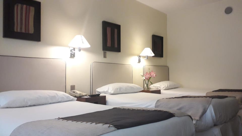Premium bedding, down comforters, minibar, in-room safe