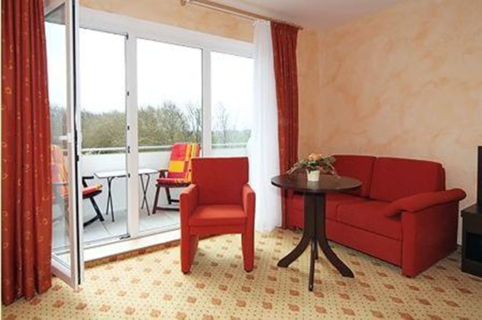 Classic Double Room, Annex Building | Living area | Flat-screen TV, fireplace