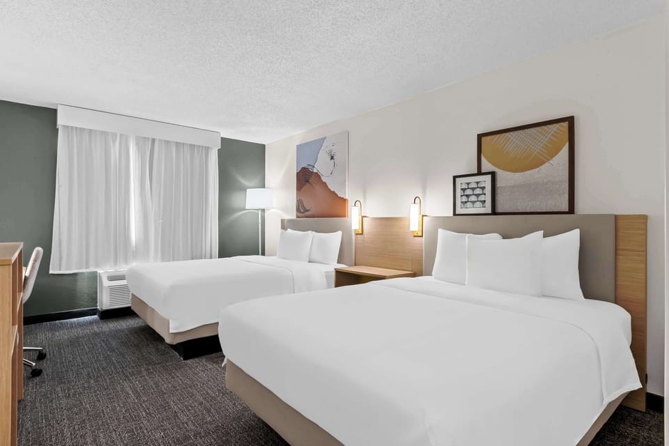 Room, 2 Queen Beds, Accessible (Mobility & Hearing, Roll-in Shower) | Desk, laptop workspace, blackout drapes, iron/ironing board