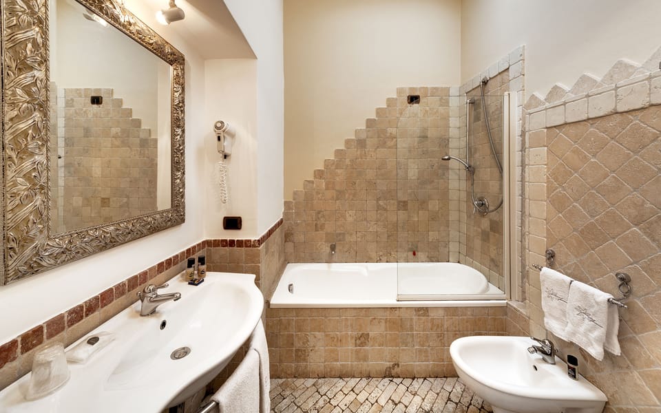 Junior Suite, Terrace, Sea View | Bathroom | Combined shower/tub, designer toiletries, hair dryer, bidet