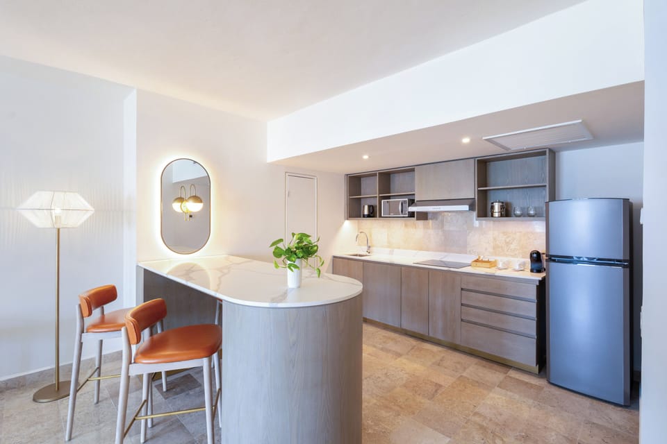 The Level, Suite, Ocean View | Down comforters, minibar, soundproofing, iron/ironing board (on request)