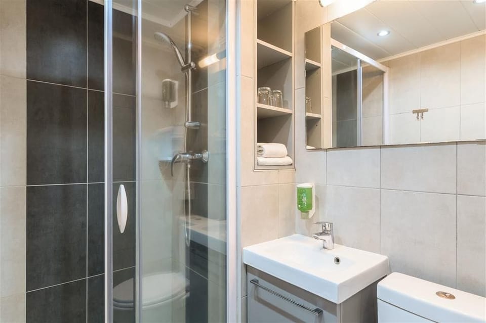 Shower, free toiletries, hair dryer, towels