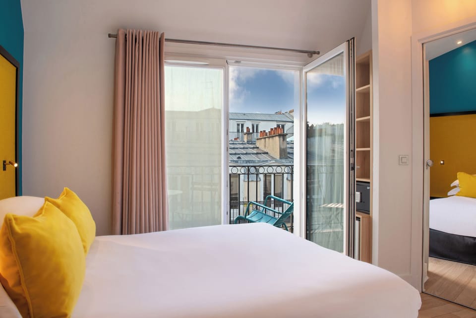 Family Suite (2 connecting rooms) | Minibar, in-room safe, desk, soundproofing