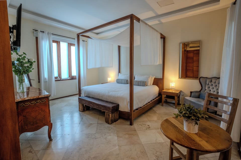 Superior Suite, Garden View | Down comforters, in-room safe, soundproofing