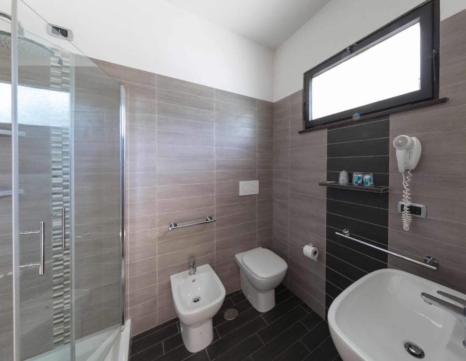 Shower, rainfall showerhead, eco-friendly toiletries, hair dryer