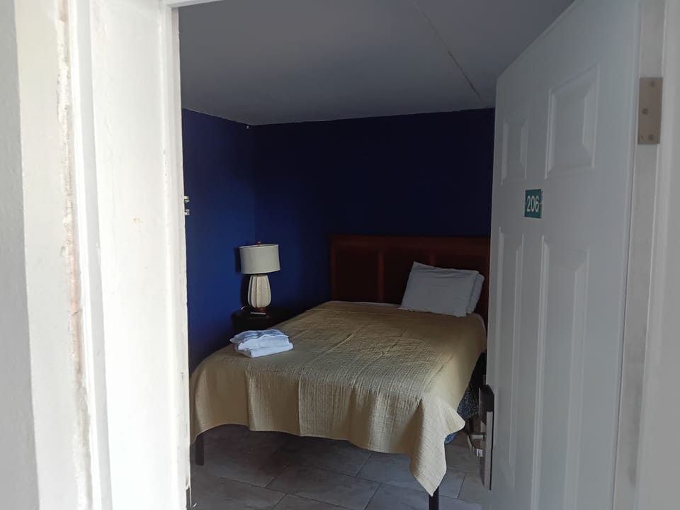 Basic Double Room Single Use, Side View | Premium bedding, rollaway beds, free WiFi